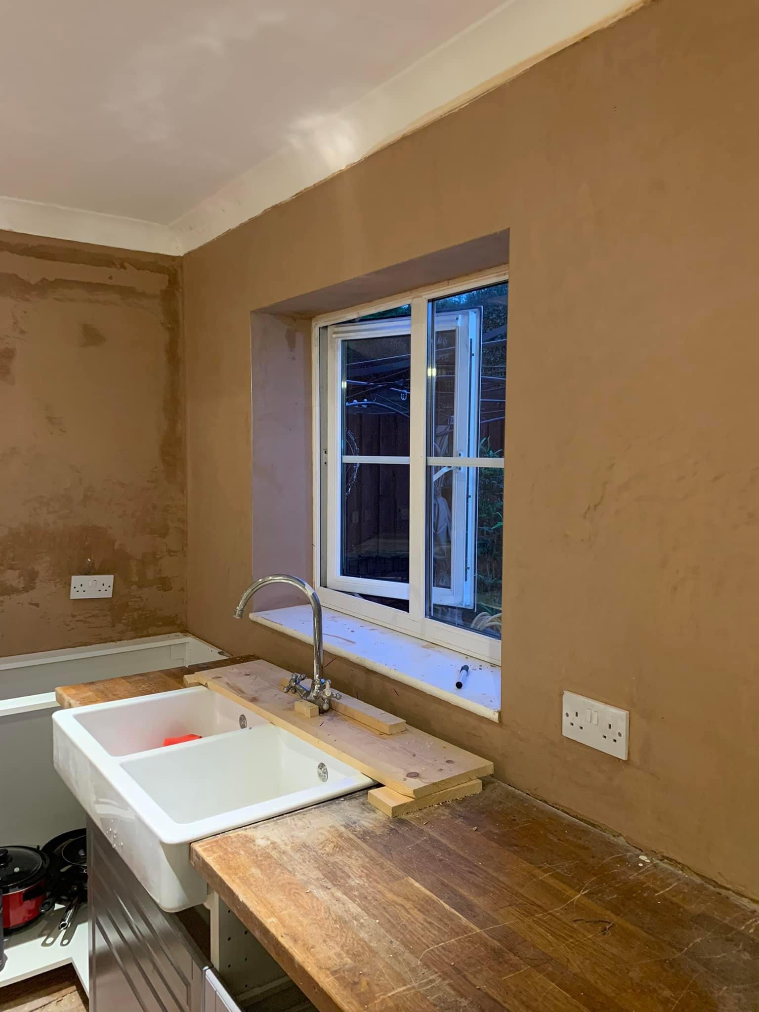 Freshly plastered wall around a window in a Littleborough kitchen